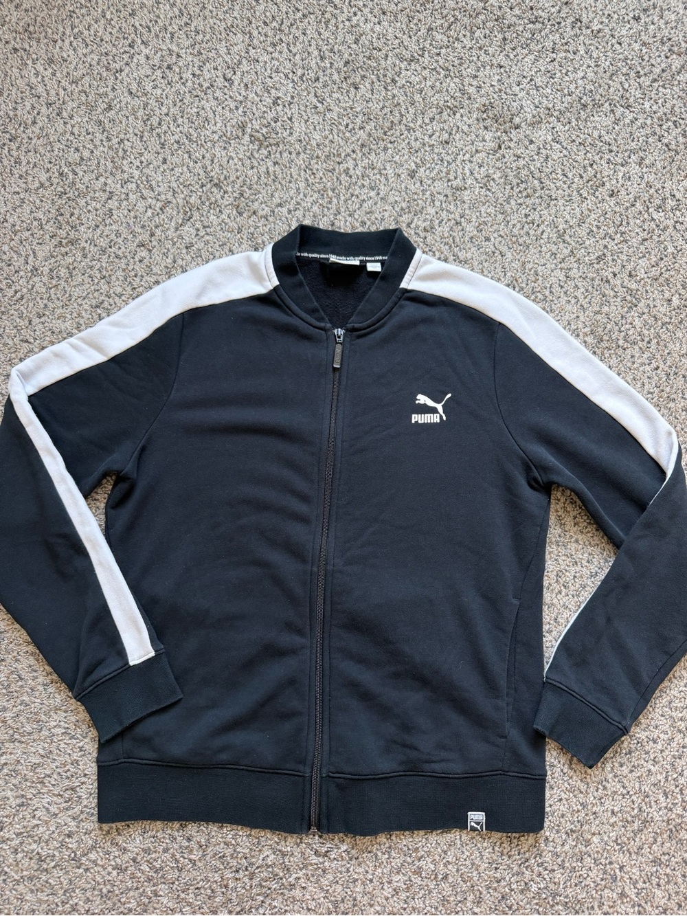 Puma Black Jacket with White Sleeve Stripes